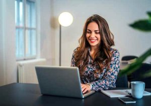 cheerful-woman-laptop.jpg